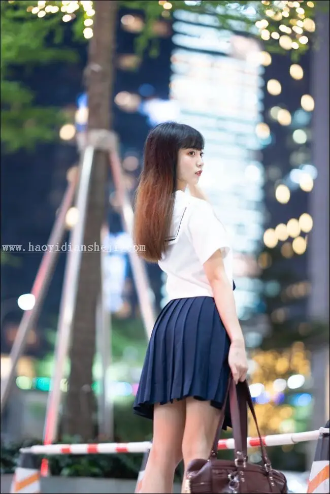 夜景人像，通过PS调出时尚夜景都市人物照片_www.haoyidiansheji.com