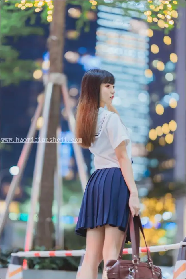 夜景人像，通过PS调出时尚夜景都市人物照片_www.haoyidiansheji.com